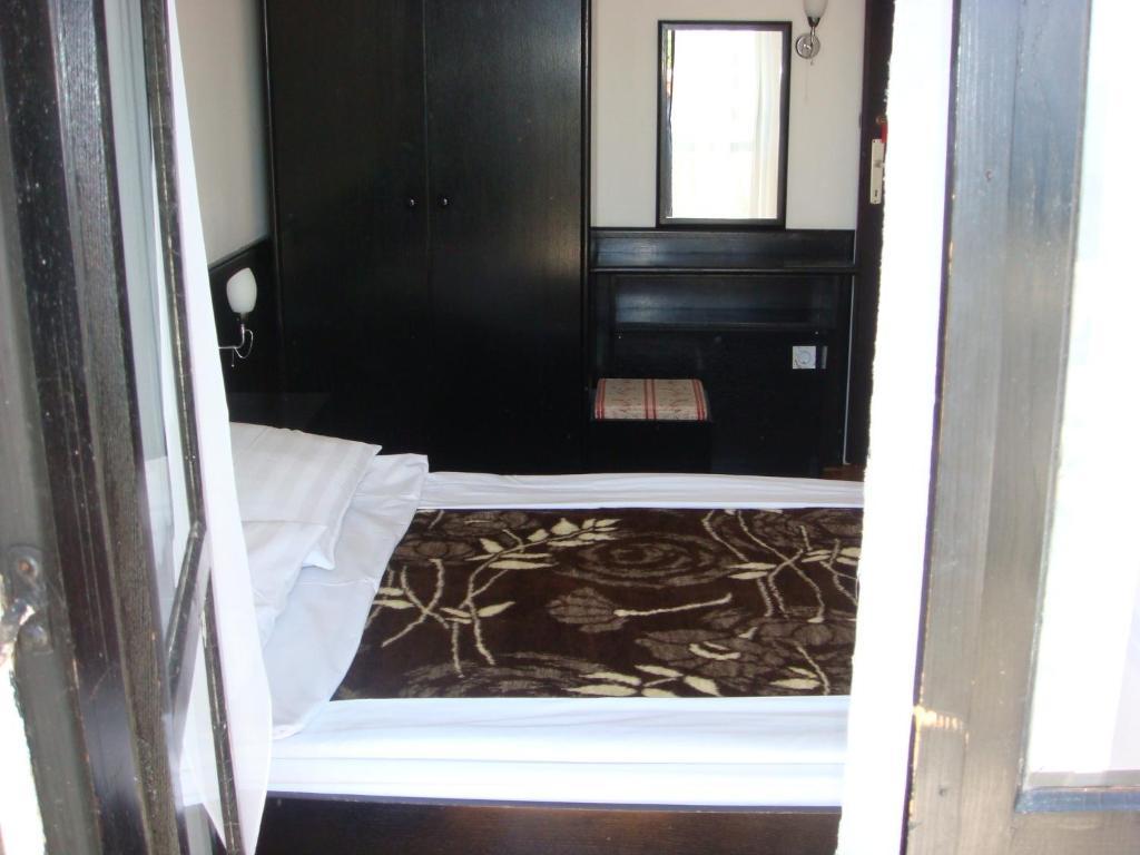 Apartmani Dragovic Sveti Stefan Szoba fotó